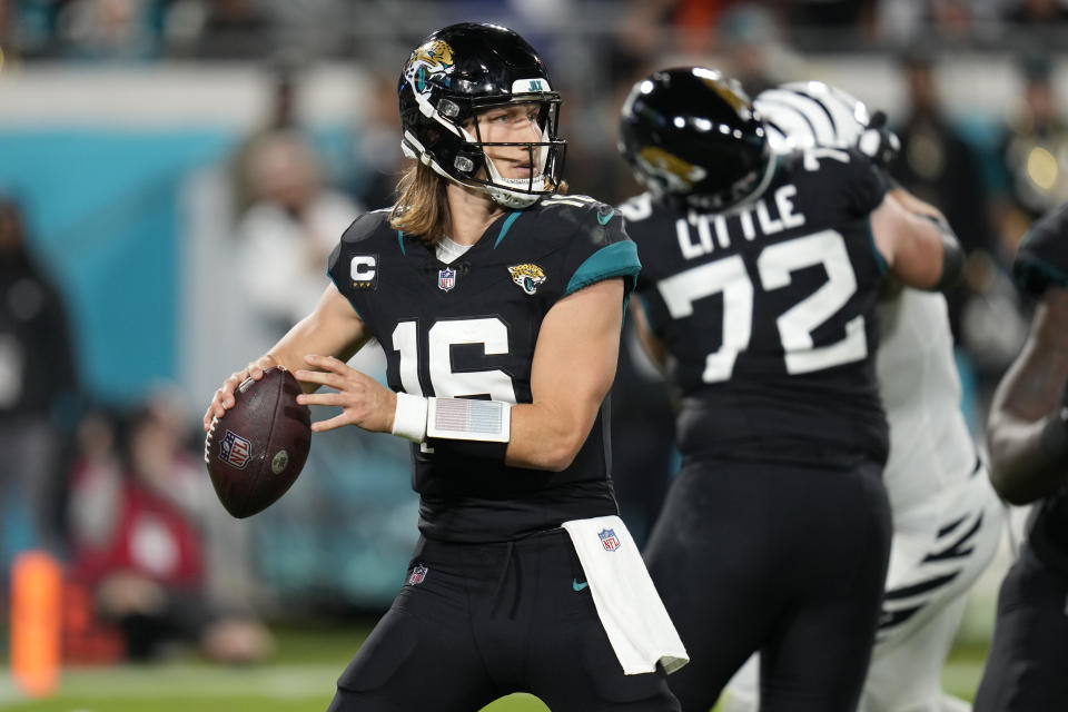 Jacksonville Jaguars quarterback Trevor Lawrence (16) aims a pass during the second half of an NFL football game against the Cincinnati Bengals, Monday, Dec. 4, 2023, in Jacksonville, Fla. (AP Photo/John Raoux)