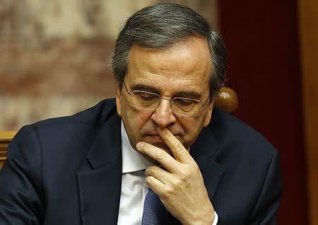 Greek Prime Minister Antonis Samaras reacts in parliament during the last round of a presidential vote in Athens December 29, 2014. REUTERS/Yannis Behrakis