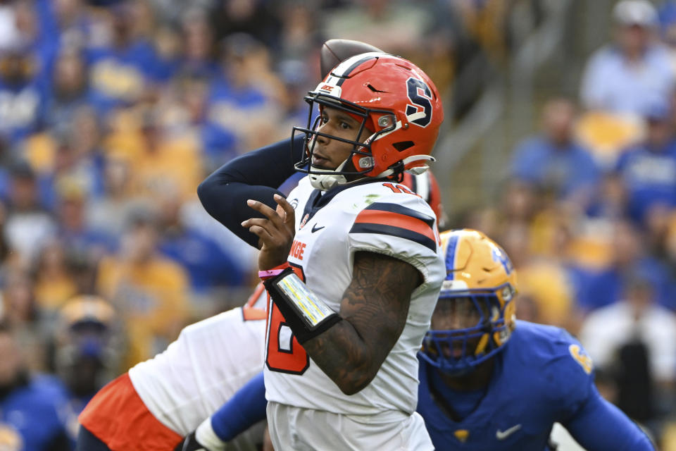 Syracuse quarterback Carlos Del Rio-Wilson (16) throws a pass against Pittsburgh during the first half of an NCAA college football game, Saturday, Nov. 5, 2022, in Pittsburgh. (AP Photo/Barry Reeger)