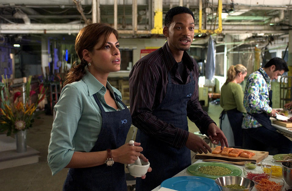 Eva Mendez and Will Smith in a cooking class.