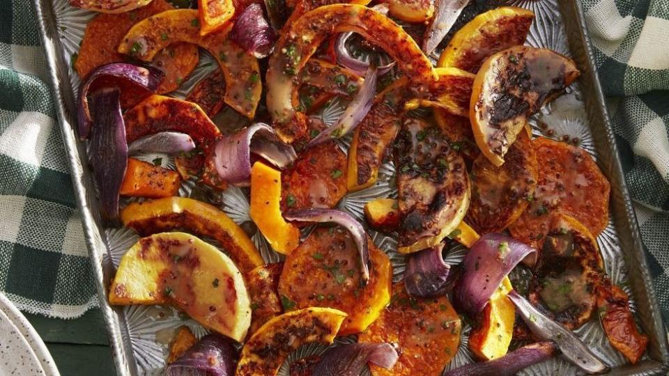roasted butternut squash with cider vinaigrette on a sheet pan