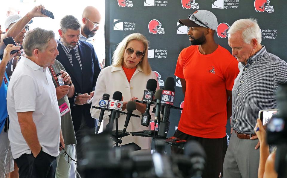 Cleveland Browns owners Jimmy and Dee Haslam and GM Andrew Berry speak to the media about Deshaun Watson's 11-game suspension during a press conference at the NFL team's training facility in Berea on Thursday.