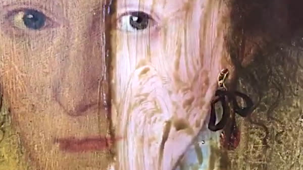 Centuries-old varnish disappears from an oil painting in a matter of minutes in two videos of a restoration that are going viral.