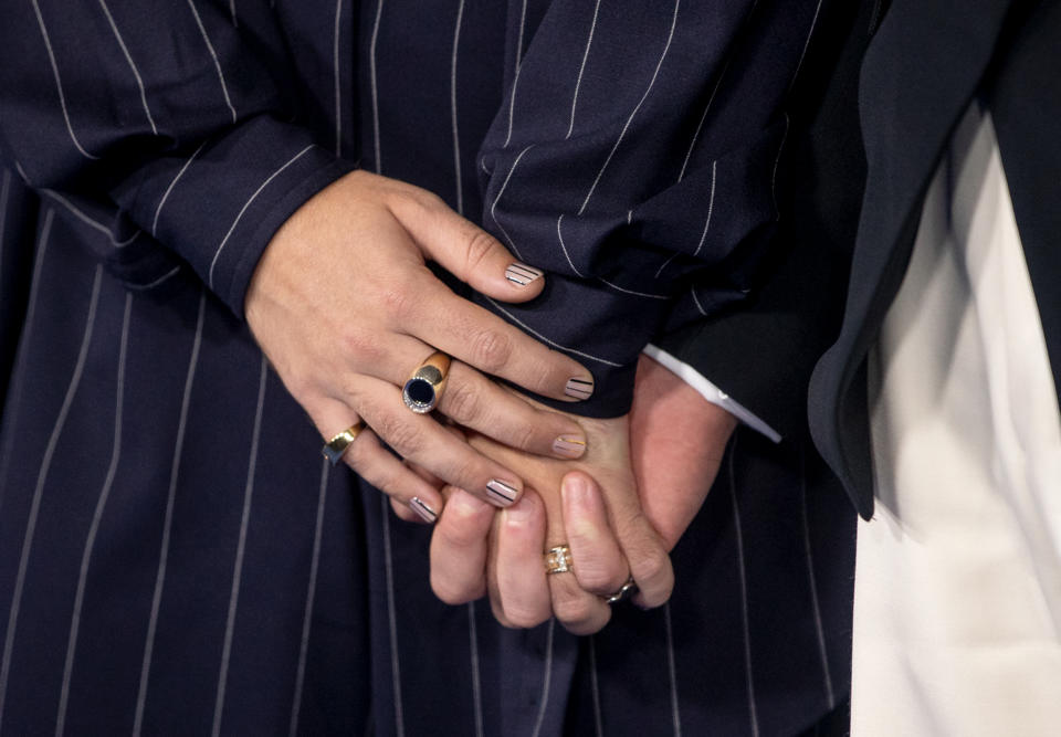 Noah Galvin and Ben Platt hold hands at the premiere. (Emma McIntyre / WireImage / Getty Images)