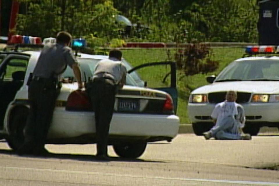 Pictured: Police train their guns on pizza delivery man Brian Wells (Netflix)