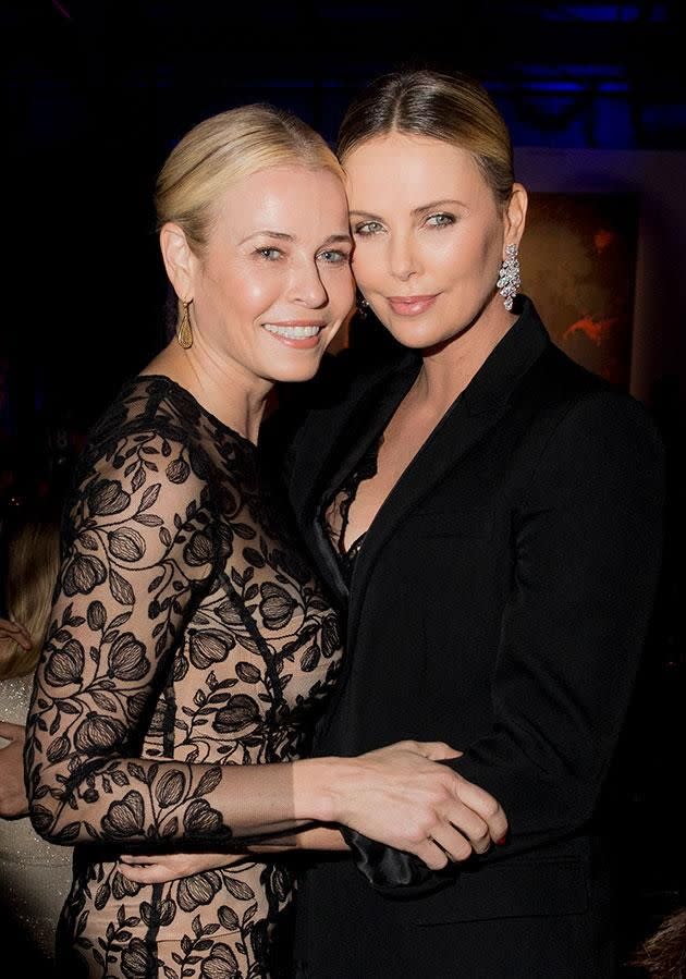 Theron is pictured with Handler at the event. Photo: Getty.