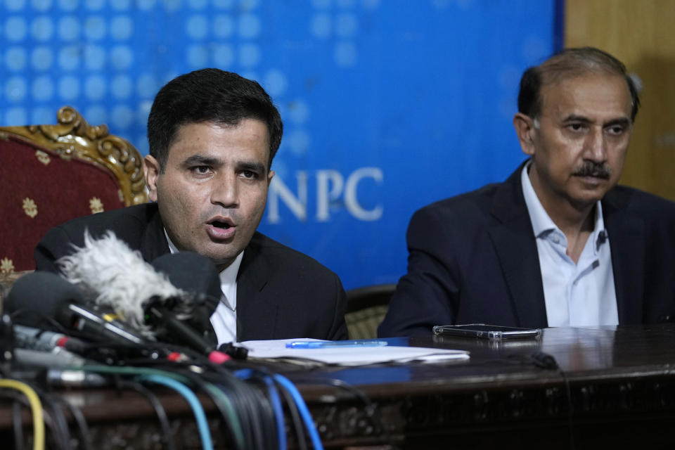 Lawyers of Pakistan's former Prime Minister Imran Khan, Naeem Haider Panjutha, left, and Shoaib Shaheen give a press conference regarding Khan's arrest and his cases in Islamabad, Pakistan, Monday, Aug. 7, 2023. Khan is now an inmate at a high-security prison after being convicted of corruption and sentenced to three years. (AP Photo/Anjum Naveed)