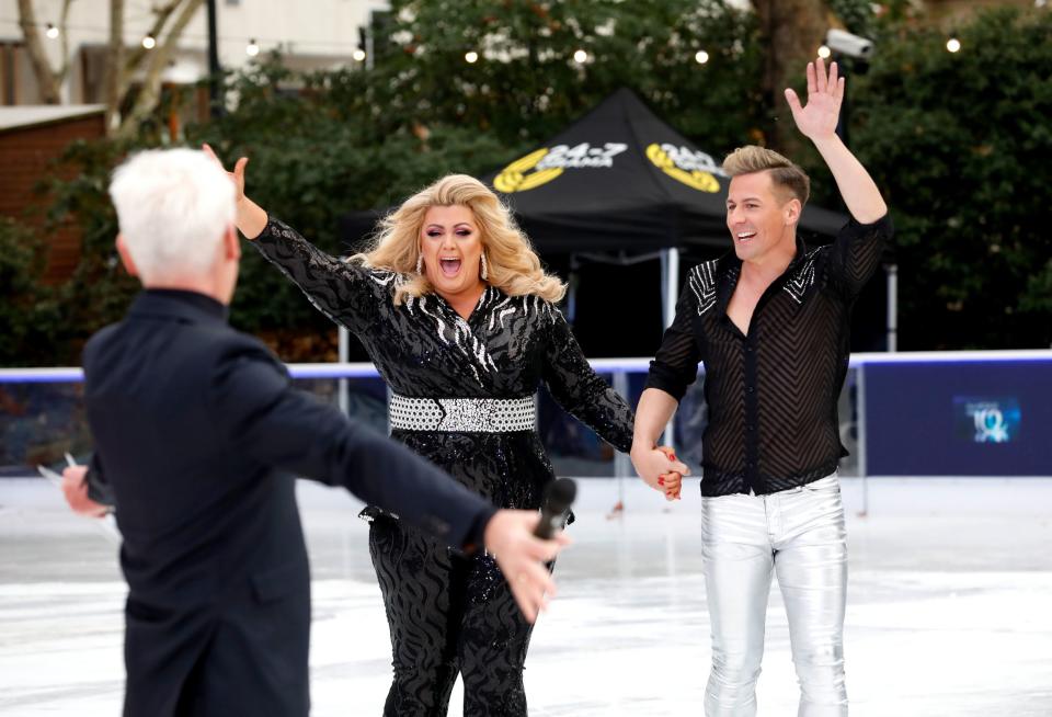 Having fun: Gemma Collins and Matt Evers on the ice (PA)