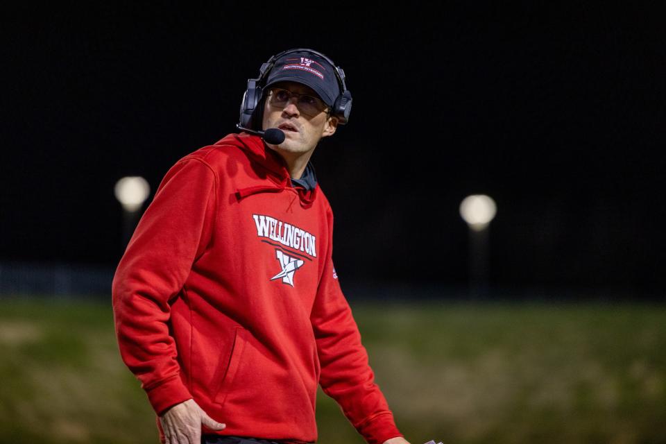 Wellington football coach Greg Proffitt, shown during a 2021 playoff game against Stratford, has the team back in the regional final.