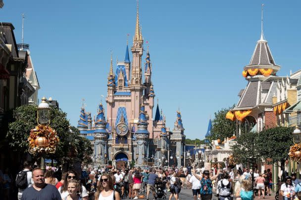 PHOTO: Visitors walk along Main Street at The Magic Kingdom at Walt Disney World in Sept. 30, 2022, in Orlando, Fla. (Bryan R. Smith/AFP via Getty Images)