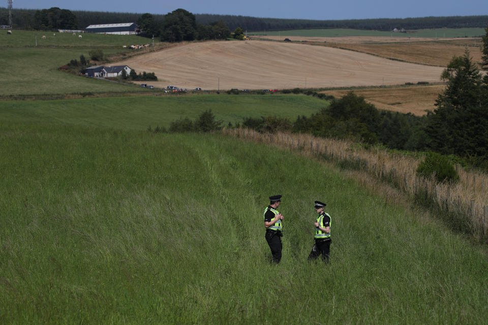 Emergency services near to the derailed train. (PA Images)