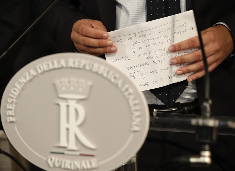 The League party leader Matteo Salvini holds his notes as he talks to the press after meeting Italian President Sergio Mattarella, in Rome, Thursday, Aug. 22, 2019. President Sergio Mattarella continued receiving political leaders Thursday, to explore if a solid majority with staying power exists in Parliament for a new government that could win the required confidence vote. (AP Photo/Alessandra Tarantino)