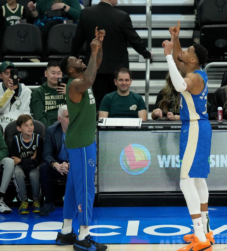 Thanasis Antetokounmpo, left, is more to the Bucks than just an older brother to Giannis.