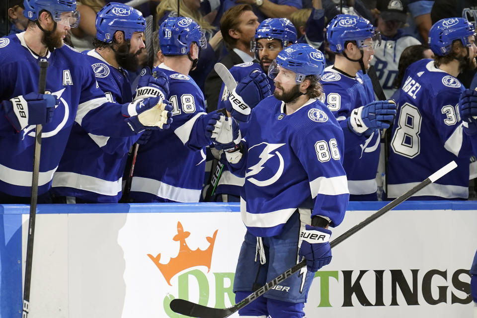 Tampa Bay Lightning right wing Nikita Kucherov (86) celebrates with the bench after scoring against the Toronto Maple Leafs during the third period in Game 6 of an NHL hockey first-round playoff series Thursday, May 12, 2022, in Tampa, Fla. (AP Photo/Chris O'Meara)