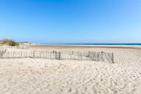 Languedoc beaches are long, flat and unkempt - Credit: GETTY