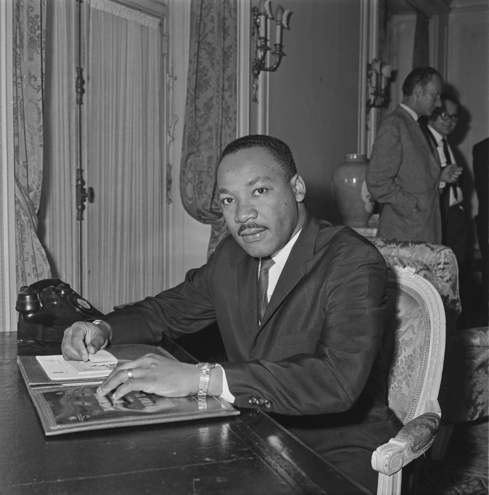 Martin Luther King Jr. sitting down