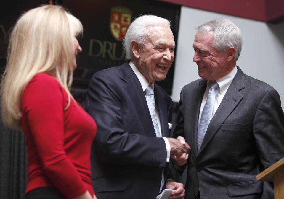 In 2013, then-Drury University president Todd Parnell welcomes alum Bob Barker, the longtime host of the TV gameshow The Price is Right, to campus.