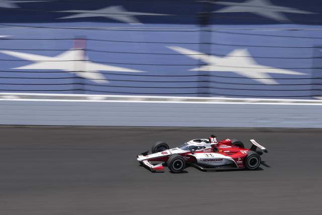 Katherine Legge, of England, drives into the first turn during practice for the Indianapolis 500 auto race at Indianapolis Motor Speedway, Monday, May 22, 2023, in Indianapolis. (AP Photo/Darron Cummings)