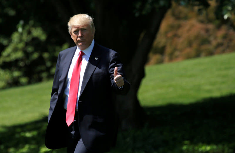 U.S. President Donald Trump gives a thumbs up as he departs the White House in Washington, U.S. April 28, 2017.  REUTERS/Kevin Lamarque