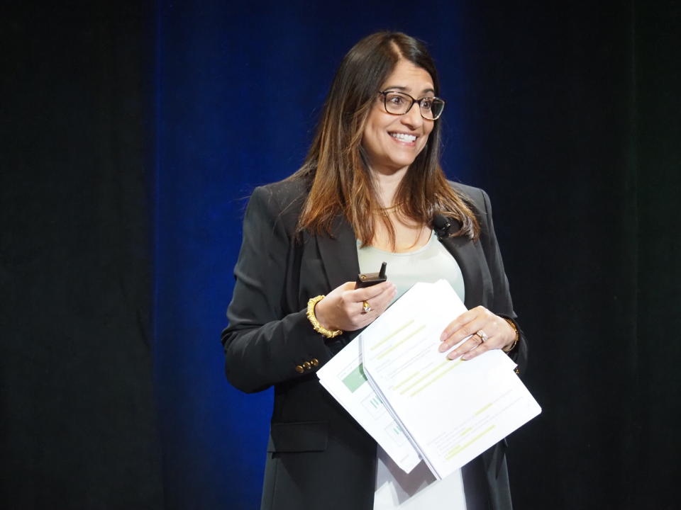  Gloria Sachdev, the president and CEO of the Employers’ Forum of Indiana, presents the Sage Transparency 2.0 project at a conference on May 13, 2024. (Whitney Downard/Indiana Capital Chronicle)