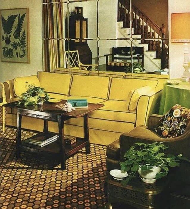 living room in the 1970s with a mirror wall