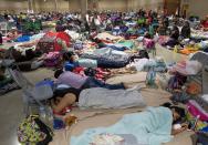 <p>Hundreds of people gather in an emergency shelter at the Miami-Dade County Fair Expo Center in Miami, Fla., Sept. 8, 2017, ahead of Hurricane Irma. (Photo: Saul LoebAFP/Getty Images) </p>