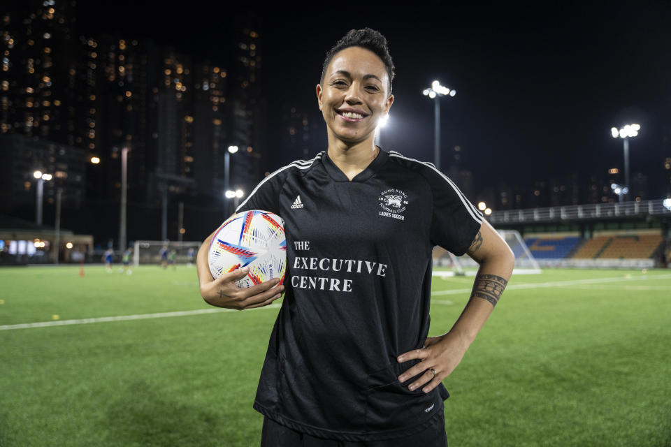 Gina Benjamin, vice captain of a Women's seven-a-side team, poses for photographs during an interview in Hong Kong, Tuesday, Oct. 31, 2023. Set to launch on Friday, Nov. 3, 2023, the first Gay Games in Asia are fostering hopes for wider LGBTQ+ inclusion in the Asian financial hub. (AP Photo/Chan Long Hei)