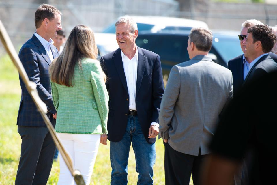 Governor Bill Lee talks with 6K Energy members during the 6K Energy groundbreaking in Jackson, Tenn. on Tuesday, Jun. 13, 2023. 