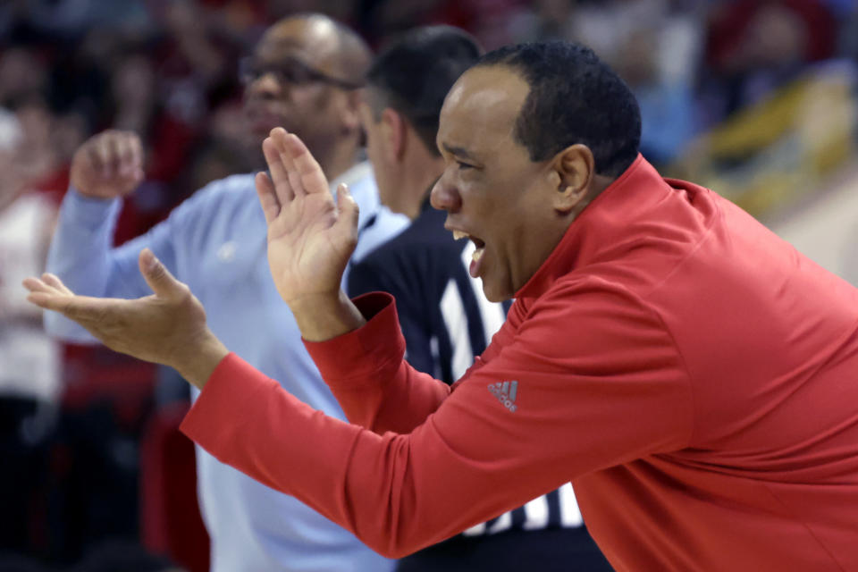 North Carolina State coach Kevin Keatts cheers on the team on during the second half of an NCAA college basketball game against North Carolina, Sunday, Feb. 19, 2023, in Raleigh, N.C. (AP Photo/Chris Seward)