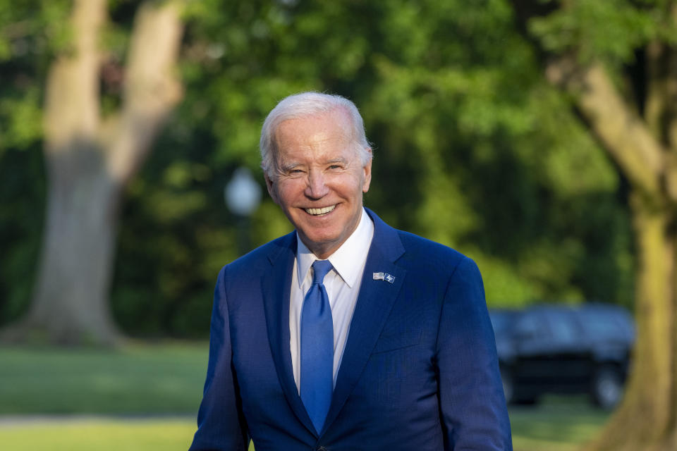 President Joe Biden smiles as he walks from Marine One upon arrival on the South Lawn of the White House, Thursday, June 1, 2023, in Washington. Biden is returning from Colorado. (AP Photo/Alex Brandon)