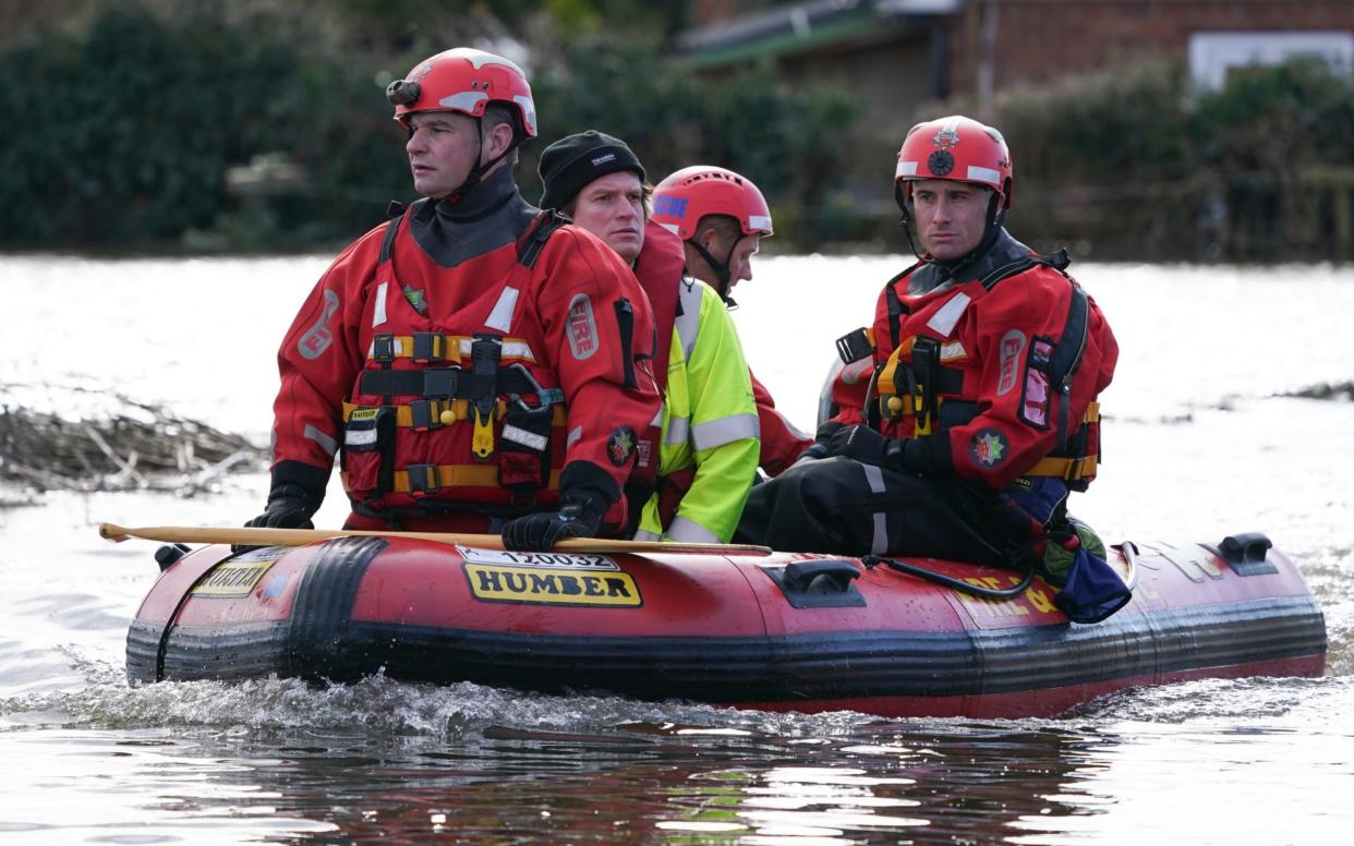 Rescue workers in East Cowick, Yorkshire, brave the floods - Ian Forsyth/Getty Images Europe