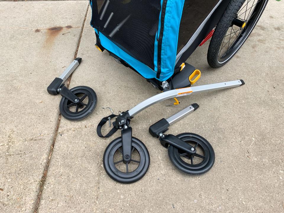 Burley's D'Lite X with a tow bar and the optional stroller accessory