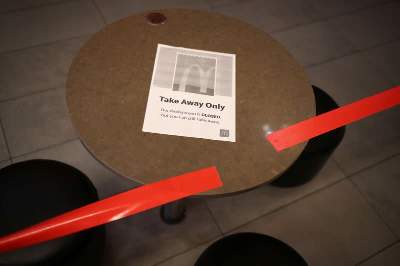 A flayer is seen over a closed McDonald's dining following the implementation of stricter social-distancing and self-isolation rules to limit the spread of the coronavirus disease (COVID-19) in Sydney