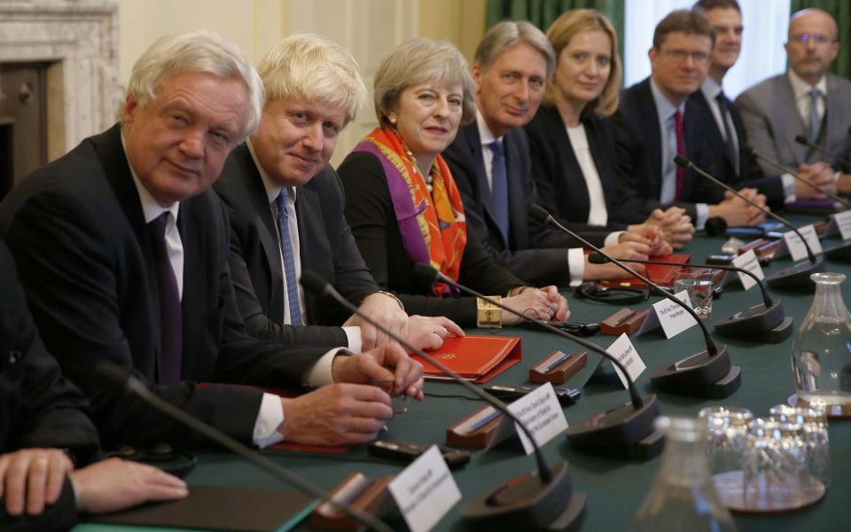 Theresa May sits with memebers of her cabinet (From left) British Secretary of State for Exiting the European Union (Brexit Minister) David Davis, British Foreign Secretary Boris Johnson, British Chancellor of the Exchequer Philip Hammond, British Home Secretary Amber Rudd and British Business, Energy and Industrial Strategy Secretary Greg Clark