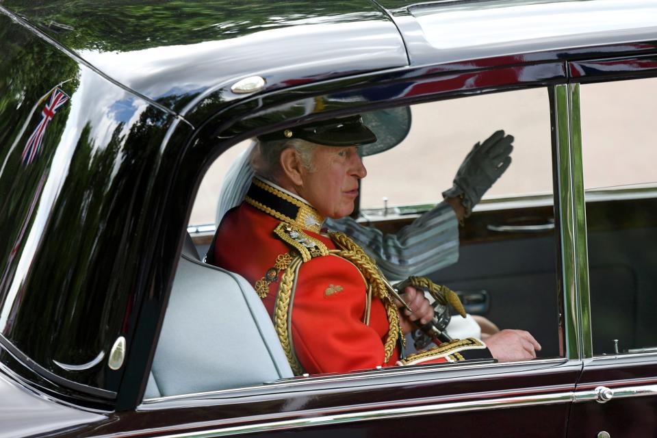 Prince Charles, Prince of Wales rides in a car during the Trooping the Colour parade.