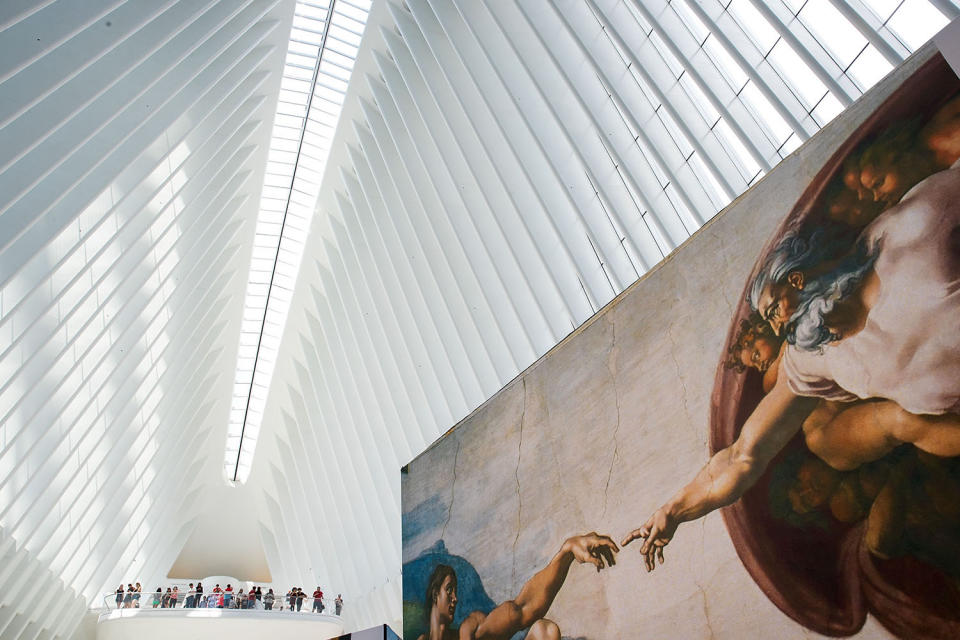 <p>Replicas of Michelangelo’s Sistine Chapel frescoes are displayed inside of the Oculus at the World Trade Center Transportation Hub in New York City. The exhibit contains 34 nearly life-size copies of the frescoes. (Photo by Drew Angerer/Getty Images) </p>