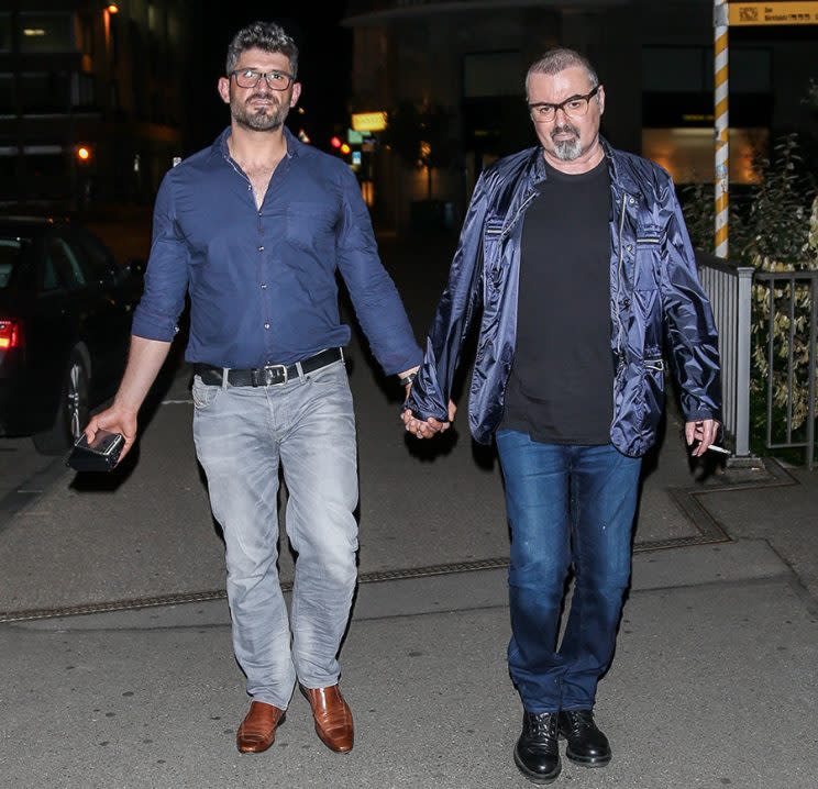 George Michael with his boyfriend, Fadi Fawaz, in Zurich, Switzerland in April 2015. (Photo: Splash News)