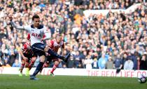 <p>Alli slots beyond Forster from the penalty spot </p>