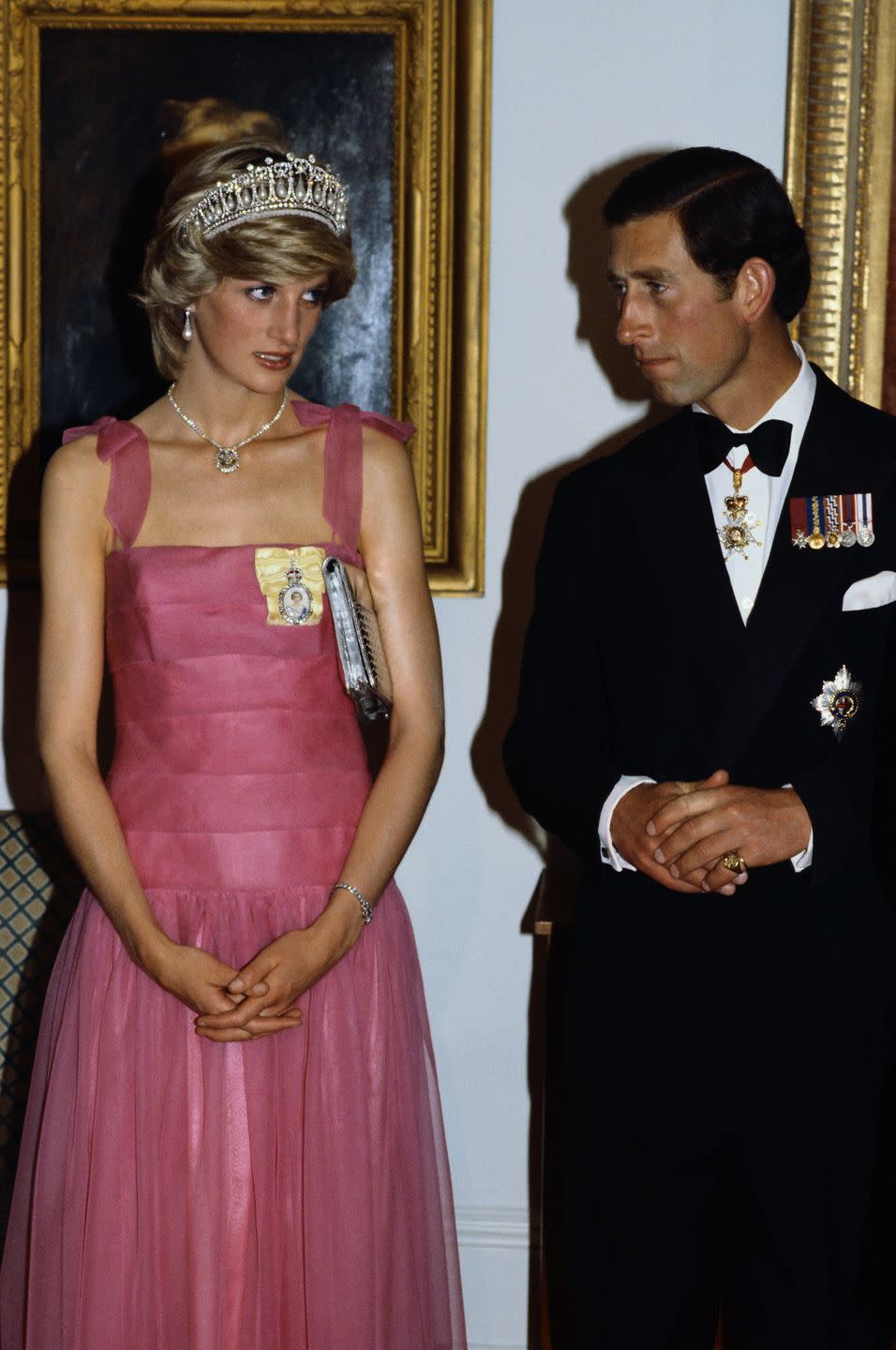 <p>Diana wears a pink Victor Edelstein gown for a reception in Brisbane alongside Charles.<br></p>