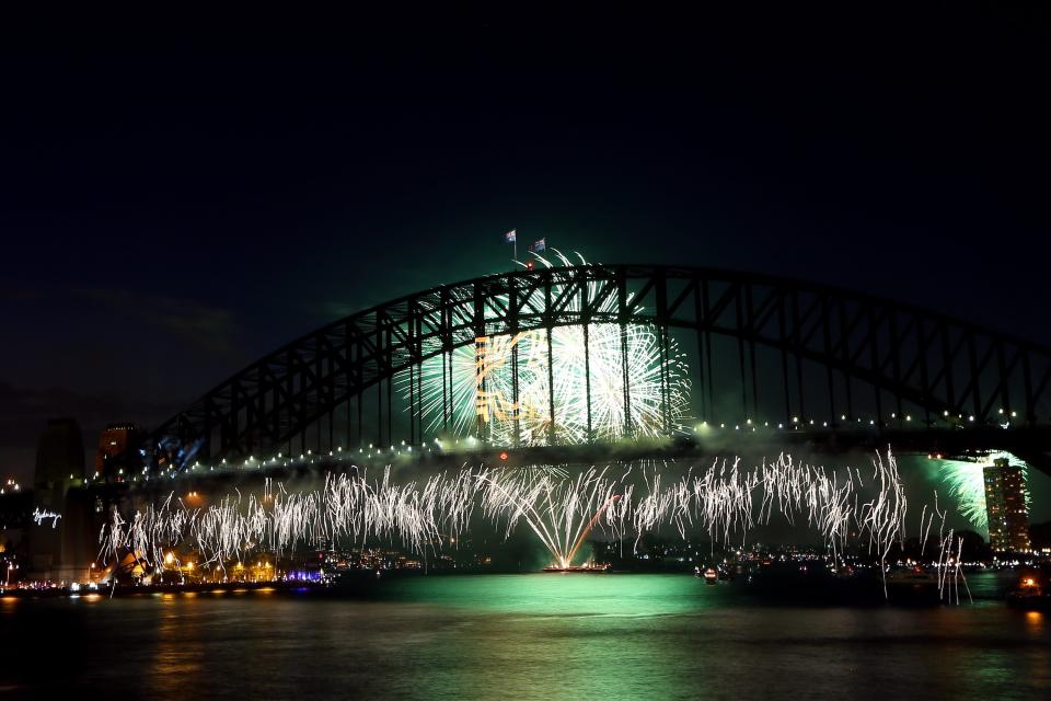 SYDNEY, AUSTRALIA - DECEMBER 31: Fireworks light up the sky during the nine o'clock show during New Years Eve celebrations on Sydney Harbour on December 31, 2012 in Sydney, Australia. (Photo by Cameron Spencer/Getty Images)