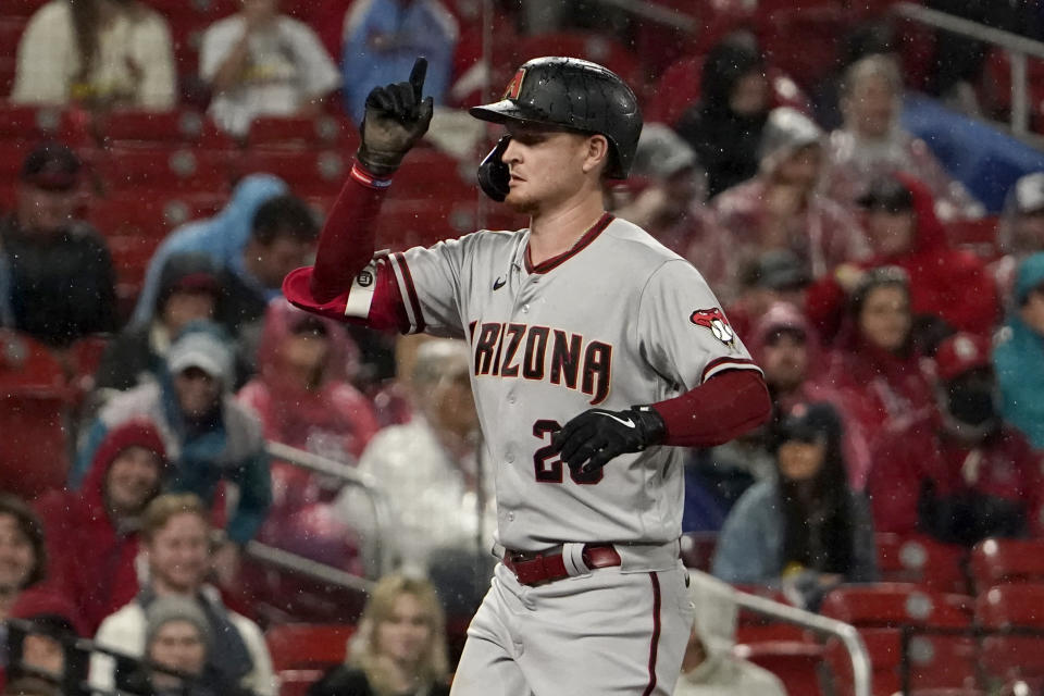 Arizona Diamondbacks' Pavin Smith celebrates after hitting a two-run home run during the eighth inning of a baseball game against the St. Louis Cardinals Thursday, April 28, 2022, in St. Louis. (AP Photo/Jeff Roberson)