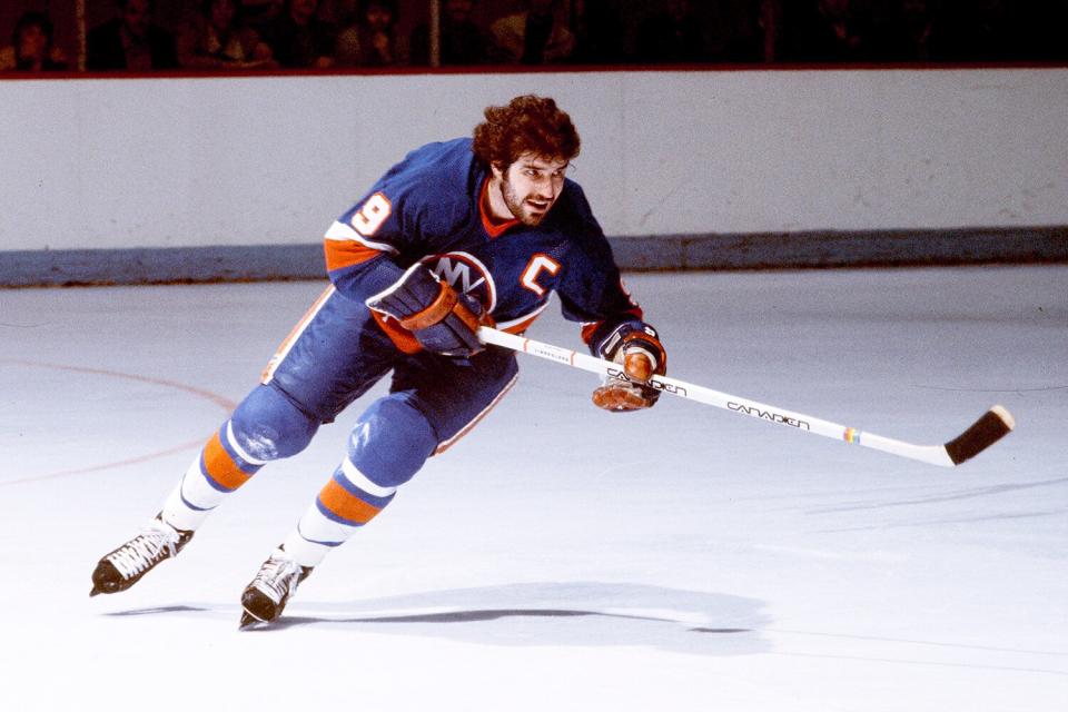 Clark Gillies #9 of the New York Islanders skates against the Montreal Canadiens Circa 1983 at the Montreal Forum in Montreal, Quebec, Canada.