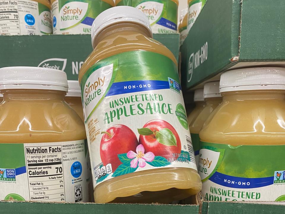 aldi unsweetened apple sauce container on a shelf