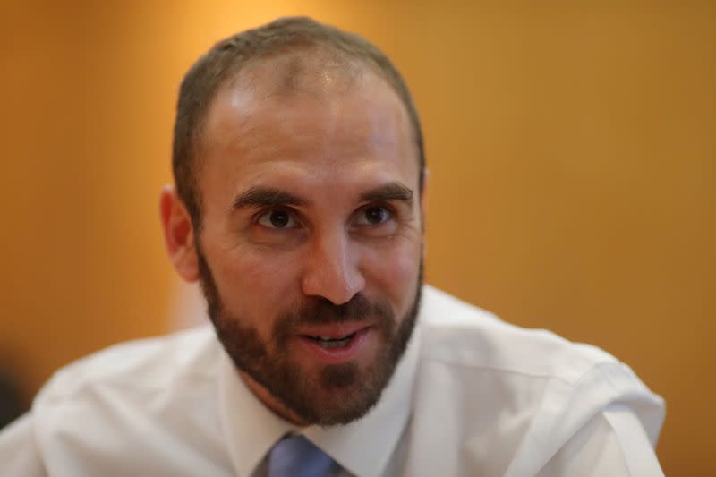 FILE PHOTO: Argentine Economy Minister Martin Guzman reacts during an interview with Reuters, in Buenos Aires