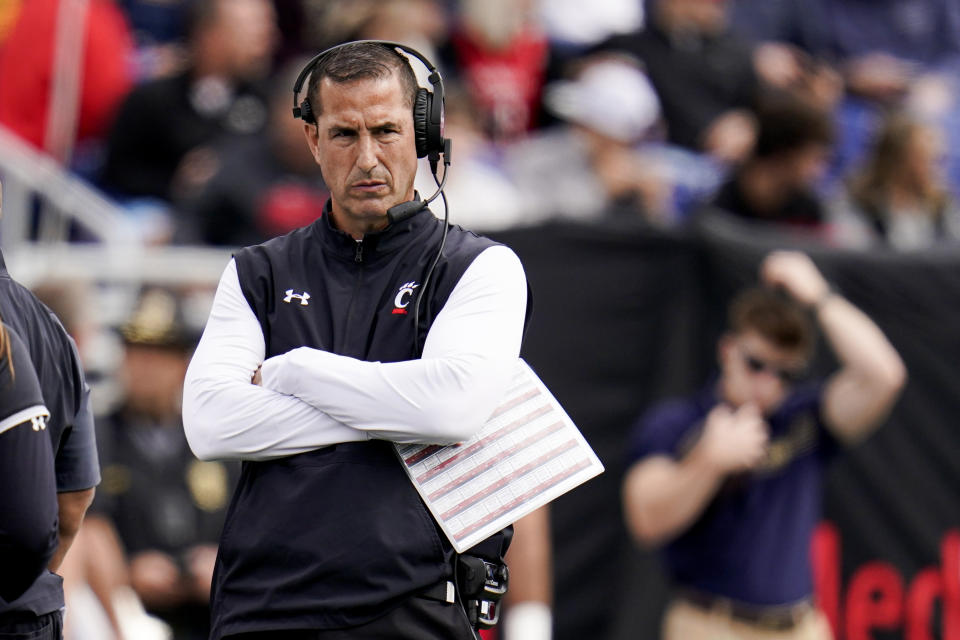 Cincinnati head coach Luke Fickell looks on during the first half of an NCAA college football game against Navy, Saturday, Oct. 23, 2021, in Annapolis, Md. (AP Photo/Julio Cortez)