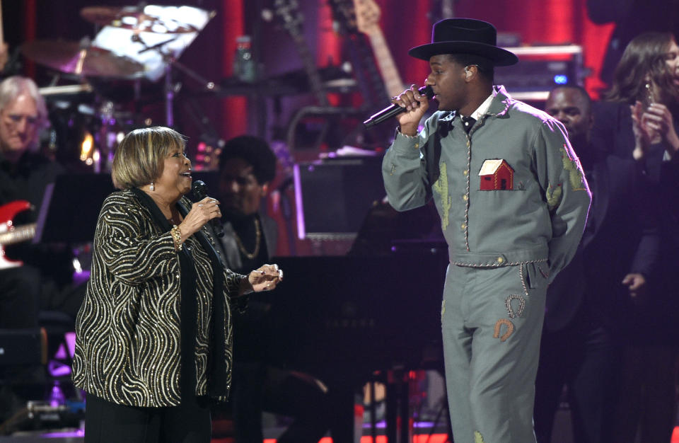 CORRECTS YEAR TO 2019 - Mavis Staples, left, and Leon Bridges perform "Not Enough" at MusiCares Person of the Year honoring Dolly Parton on Friday, Feb. 8, 2019, at the Los Angeles Convention Center. (Photo by Chris Pizzello/Invision/AP)