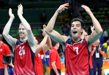 2016 Rio Olympics - Volleyball - Final - Men's Bronze Medal Match USA v Russia - Maracanazinho - Rio de Janeiro, Brazil - 21/08/2016. Kawika Shoji (USA) of USA celebrates. REUTERS/Yves Herman