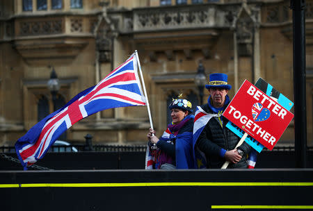 Anti-Brexit demonstrators protest outside the Houses of Parliament, in Westminster, London, Britain, February 13, 2019. REUTERS/Hannah McKay