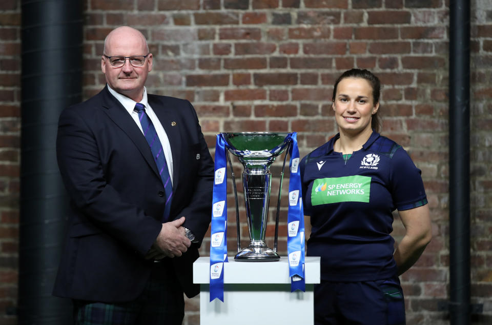 Scotland head coach Philip Doyle and Scotland's Rachel Malcolm pose with the Six Nations trophy   Action Images via Reuters/Peter Cziborra