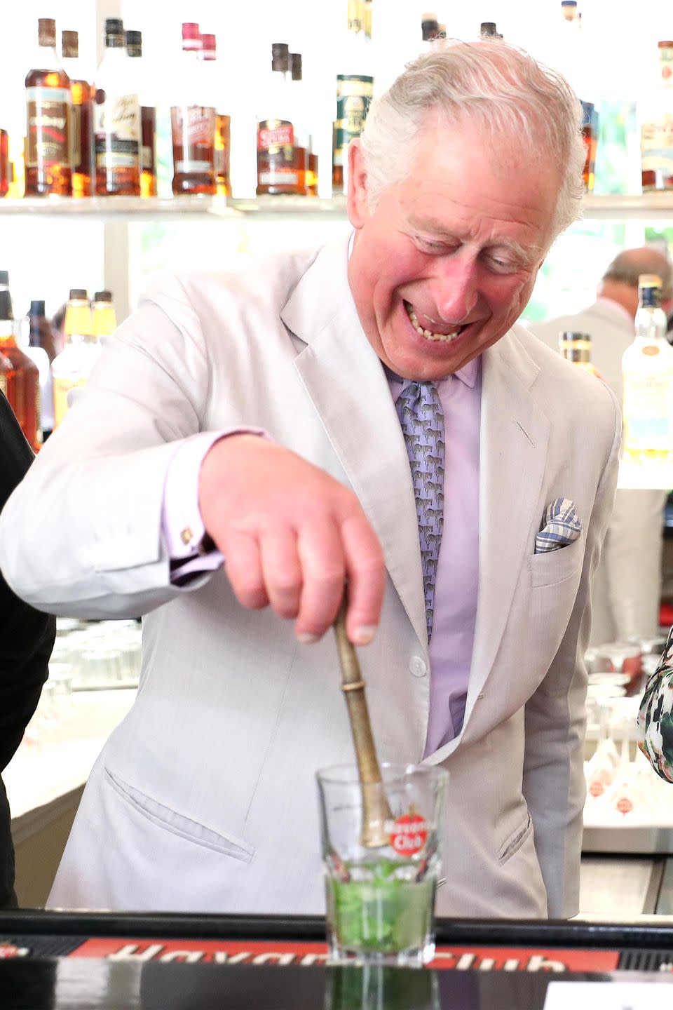 <p>Prince Charles prepares a mojito during the first royal visit to Cuba.</p>